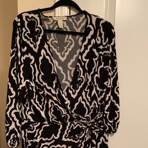 Faux wrap dress. Very comfortable & easy to wear